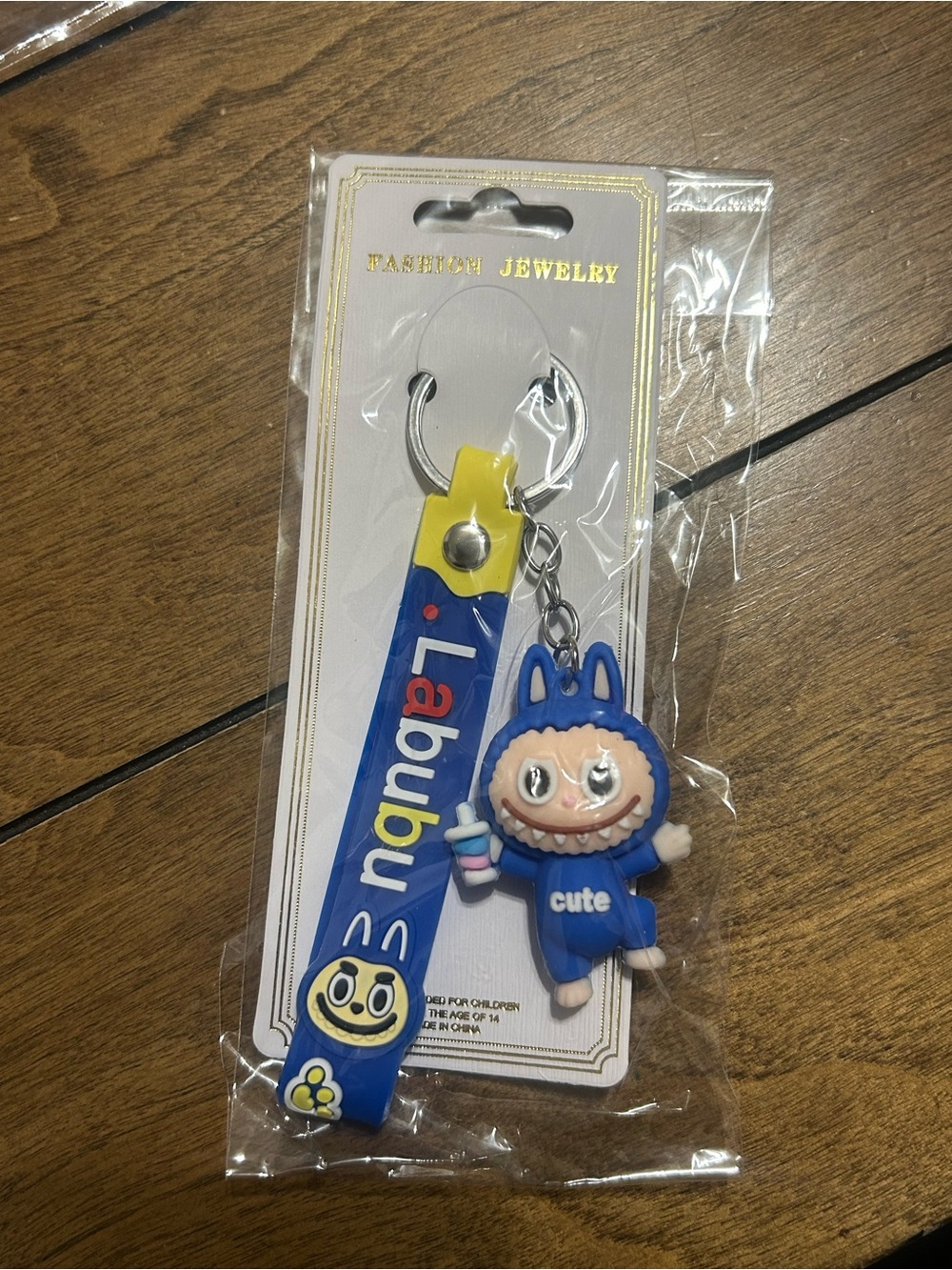 Cute Blue Labubu Character Keychain with Yellow Accent Strap